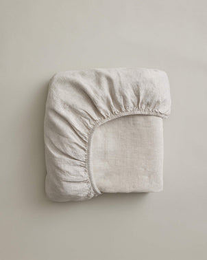 Natural linen fitted sheet from CULTIVER, showcasing a soft, breathable bed linen with a snug fit and clean design.