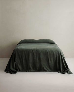 files/HeavyweightBedcoverPinePulledBackBed.jpg