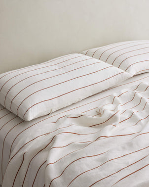files/Pillowcases_Cedar_Stripe_Styled_on_Bed.jpg