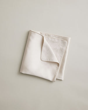 Cultiver Silk Linen Flip Pillowcase in Smoke, showcasing its soft, luxurious fabric and stylish folded design for bed linen.