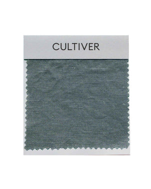 cultiver.momplimentary Bluestone swatch card displaying fabric color samples on textured material with blue and gray tones.