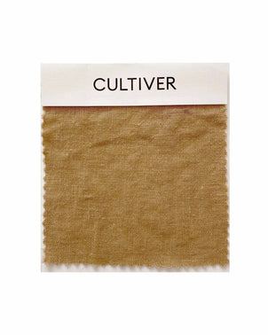 cultiver.momplimentary swatch card featuring natural sand-colored fabric swatches for fabric and textile matching.