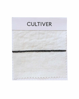 cultiver.momplimentary swatch card featuring truffle stripe fabric samples in neutral tones and textured patterns.