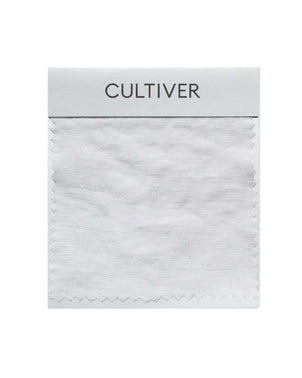 The Complimentary Swatch - White, featuring zig-zag cut edges, is presented on a card labeled CULTIVER at the top, offering an elegant touch to any collection of fabric samples for home decor.